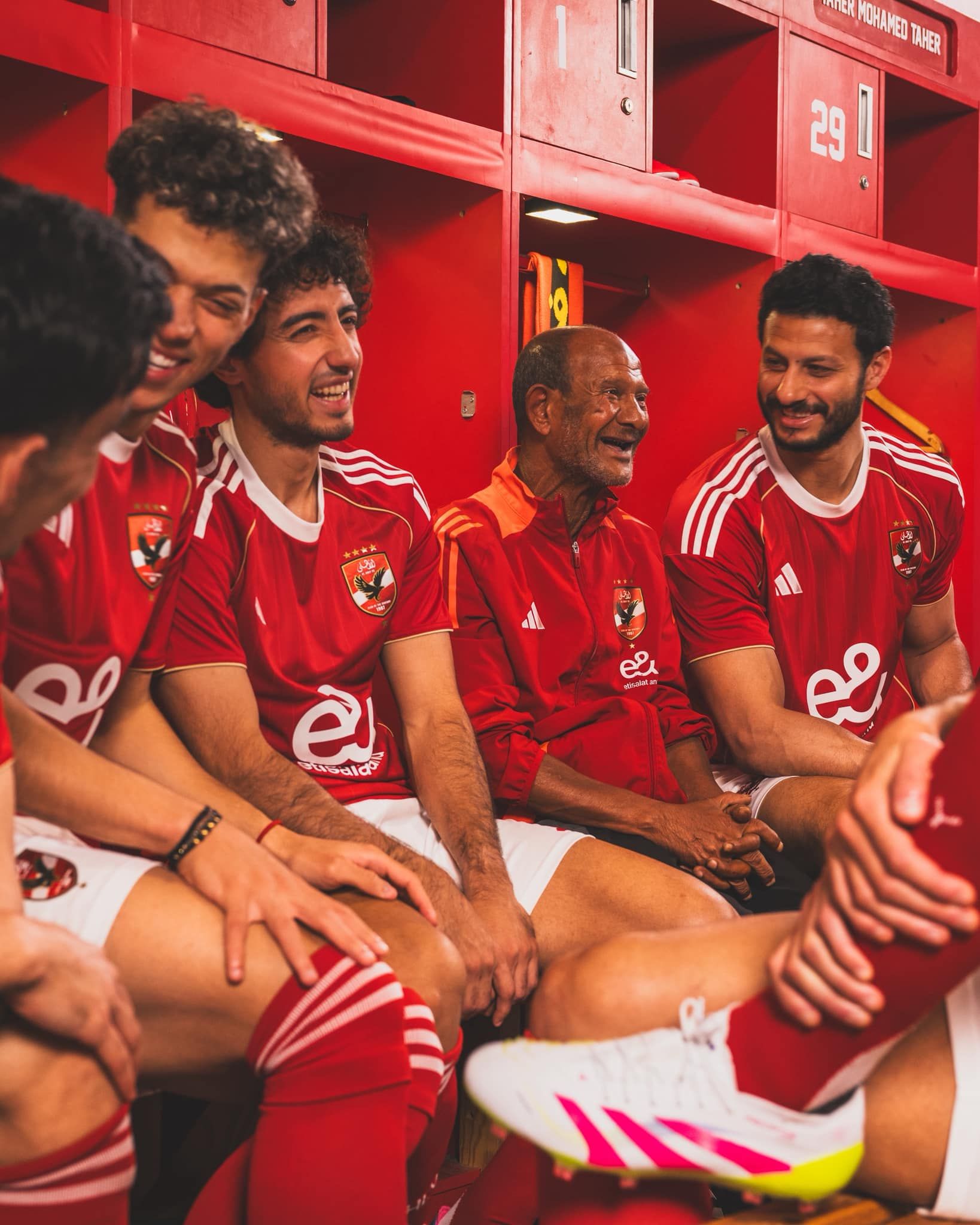 May be an image of 3 people, people playing football, people playing soccer and text