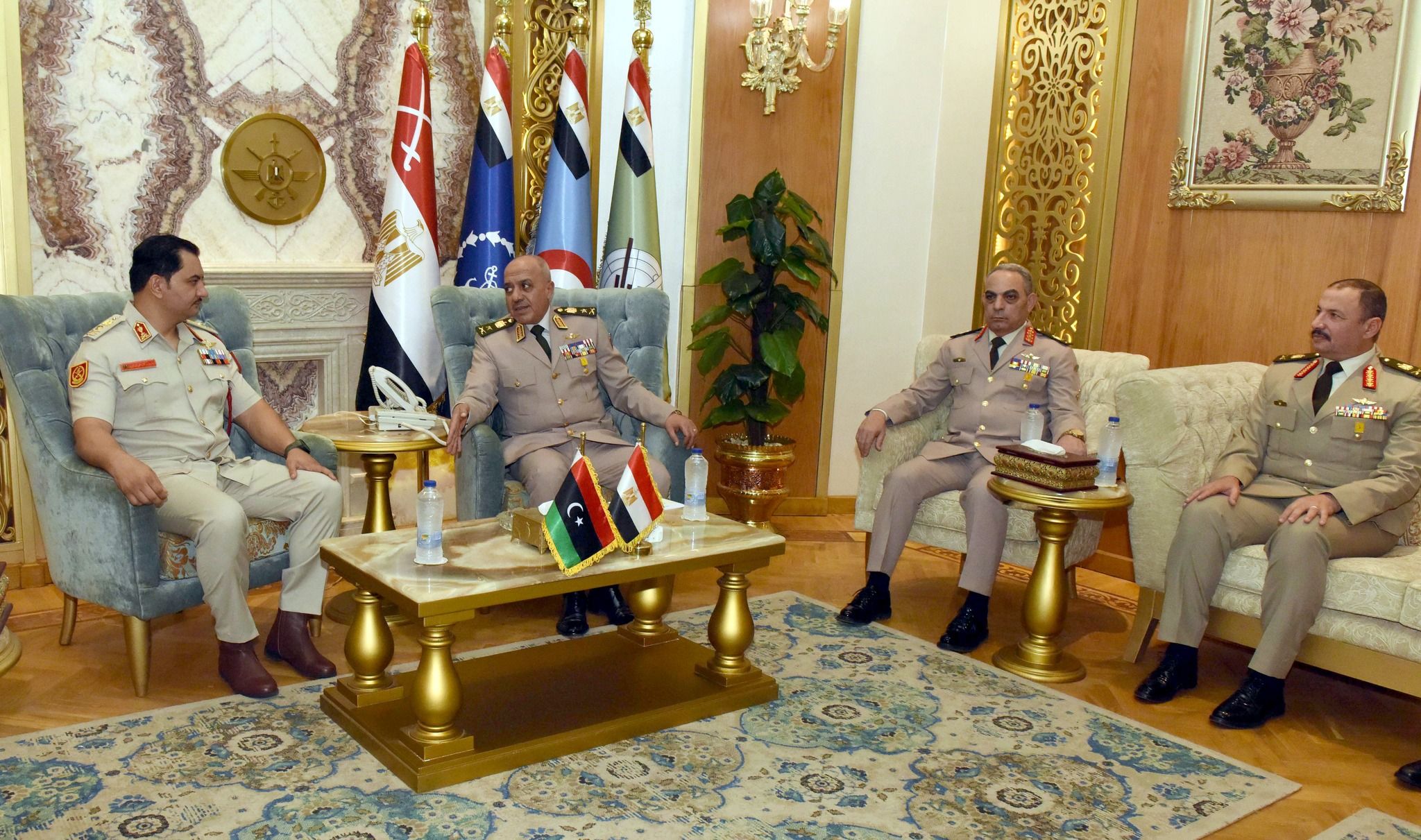 May be an image of 4 people, the Oval Office and text