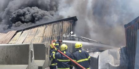 بالصور .. الدفاع المدني يتعامل مع حريق في مستودع مؤسسة تجارية شرق عمّان - تليجراف الخليج